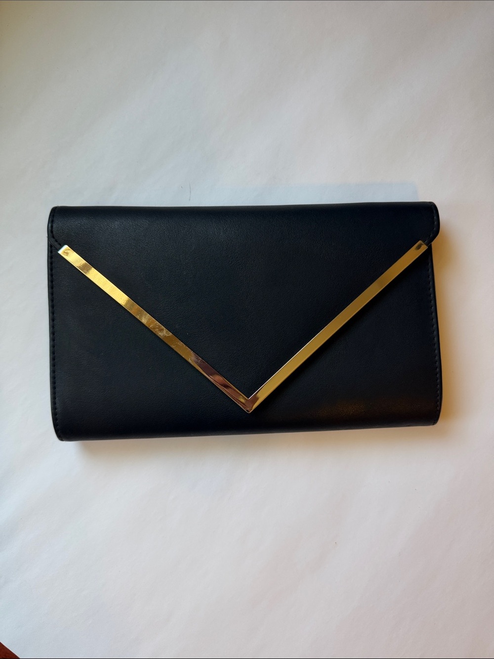 Aldo Black Crossbody Clutch with Gold Accent and removable shoulder strap